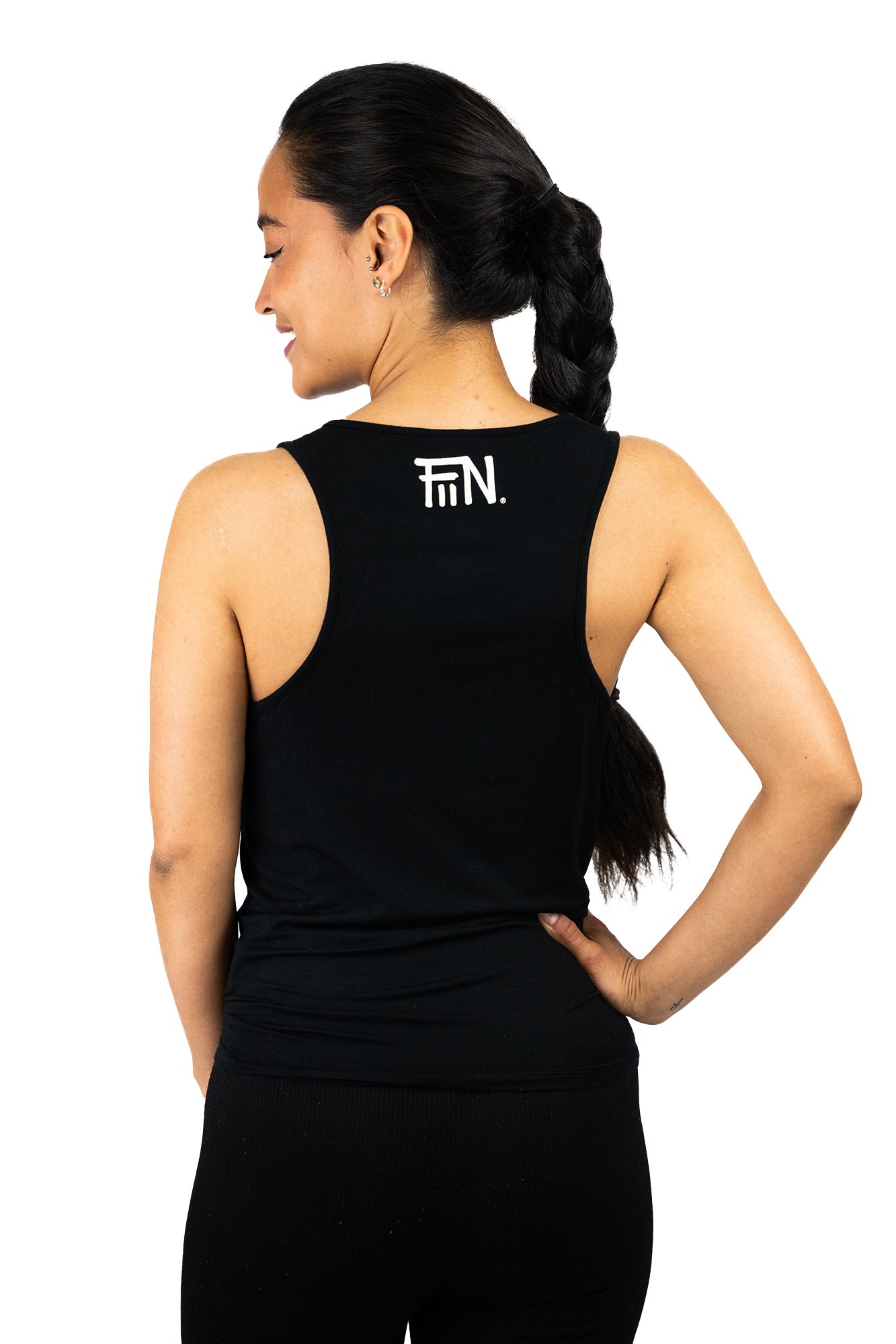 Sporttop für Frauen mit stylischem Knoten und lässigem Schnitt. Farbe schwarz.