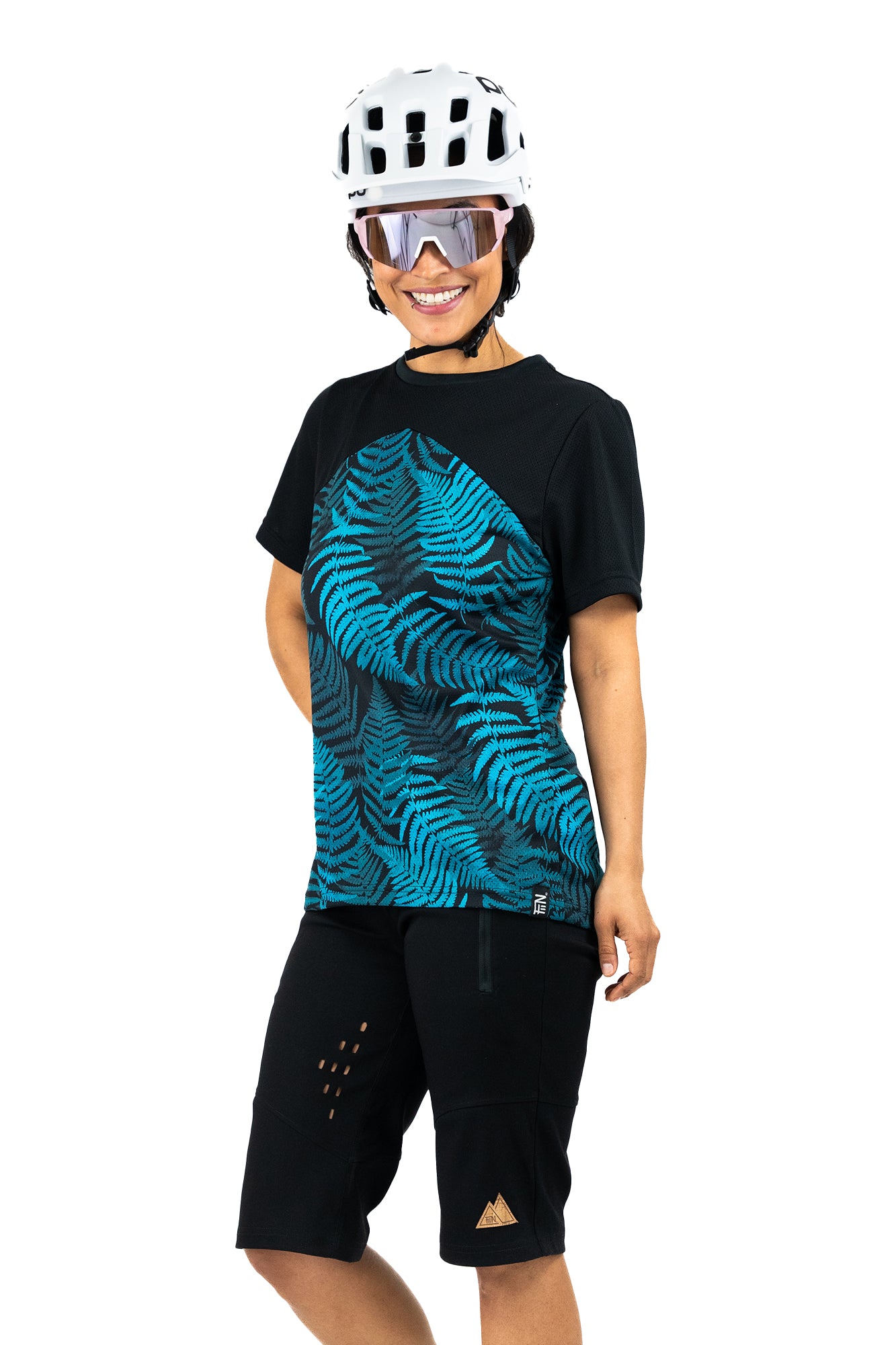 Mountainbikejersey für Frauen mit Floralem Farn Print. Kurzarmtrikot in petrol und schwarz.